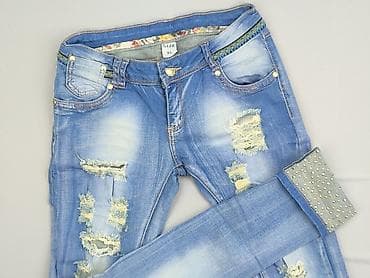 dziurawe dżinsy: Jeansy damskie, rozmiar XL — 1