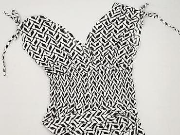 Kombinezon damski L/XL – czarno-biały, geometryczny wzór - Fason