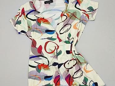 divided sukienki: Sukienka damska, rozmiar M — 1