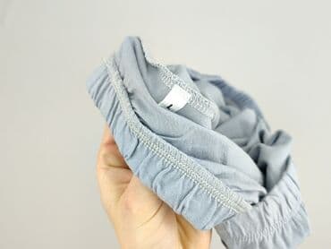 krótkie spodenki i nogi z cellulitem: Spodnie 3/4 damskie, L — 5