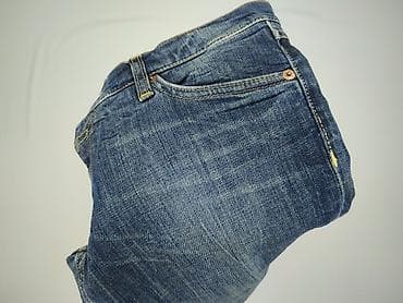 biale trampki mustang: Jeansy damskie, rozmiar M — 5