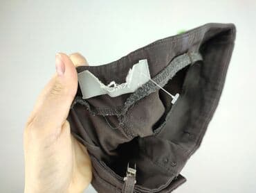 spodnie dresowe nike bez ściągaczy: Material trousers for women, size L (EU 40) — 4