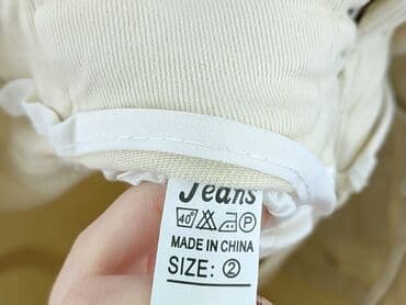 jeansy z piórami: Jeansy damskie, rozmiar S — 4