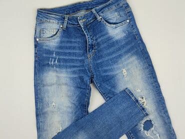 dziurawe dżinsy: Jeansy damskie, rozmiar L — 2