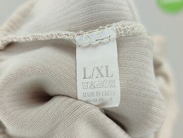 krótkie spodenki do rajstop: Spodnie 3/4 damskie, rozmiar L — 4