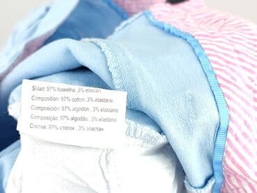jeansy dla puszystych pań: Spodnie materiałowe damskie, rozmiar 2XL — 5