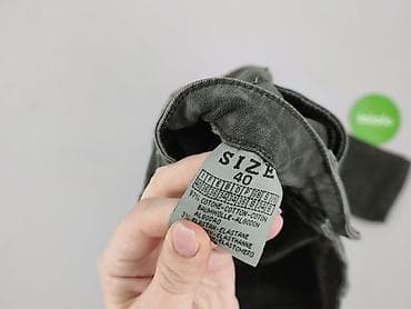 jeansu z dziurami: Jeansy damskie, rozmiar L — 4