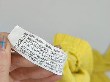 zolte: Spodnie materiałowe damskie, rozmiar L — 6