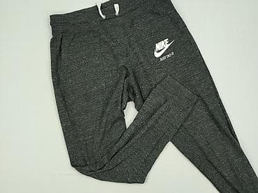 buty slippers: Nike, Spodnie dresowe damskie, rozmiar M — 1