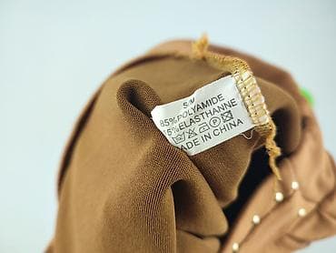 reebok dresy: Legginsy Eleganckie damskie, rozmiar M — 4