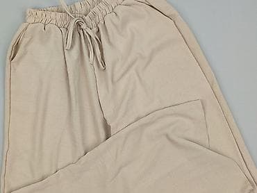 szerokie spodnie materialowe: Damskie szerokie spodnie w kolorze beżowym - Krój: luźny, proste — 1