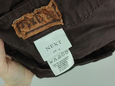 krótkie spodenki i nogi z cellulitem: Szorty damskie, rozmiar M — 5