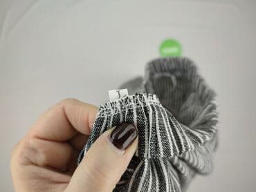 spodnie dresowe peak performance: Material trousers for women, L — 4