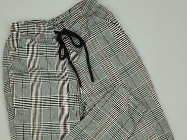 Damskie spodnie w kratę – joggery - Fason: joggery z lekko zwężaną