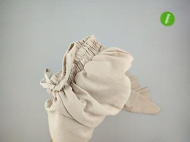 szerokie spodnie materialowe: Damskie szerokie spodnie w kolorze beżowym - Krój: luźny, proste — 4