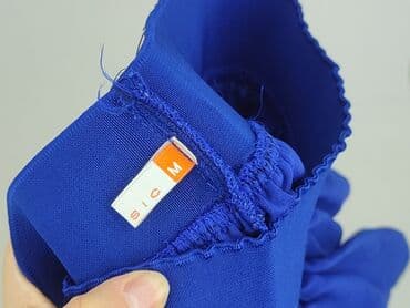 spódniczka mini rozkloszowane: Spódnica damska, rozmiar M — 4