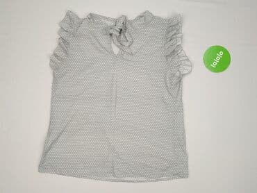 modne bluzki z bufiastymi rękawami: Bluzka damska, rozmiar M — 2