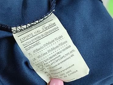 w spodniczce: Spódnica damska, rozmiar L — 4