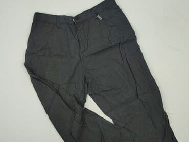 Ubrania damskie: Jeansy damskie, rozmiar XL — 1