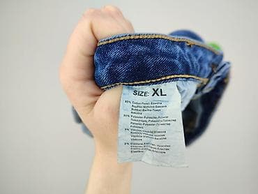 flared jeans: Jeansy damskie, rozmiar XL — 4