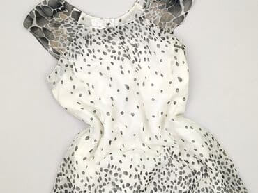Women`s dress, size XL (EU 42)