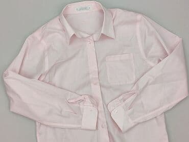 skladanie koszulki: Koszula damska, rozmiar S — 1