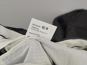 sklep second hand: Spodnie garniturowe dla mężczyzn, rozmiar L — 5