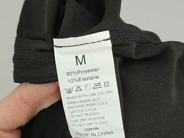 leginsy m: Bluza damska
, rozmiar M — 4