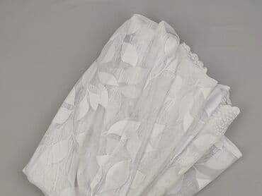 Biała firana żakardowa z motywem liści - Materiał: lekki at lalafo.pl Biała firana żakardowa z motywem liści - Materiał: lekki