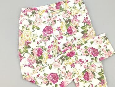 Ubrania damskie: Jeansy damskie, rozmiar L — 1