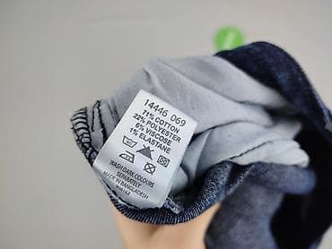 bell bottom jeans: Spodnie 3/4 damskie, rozmiar XL — 5