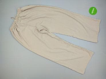 szerokie spodnie materialowe: Damskie szerokie spodnie w kolorze beżowym - Krój: luźny, proste — 3