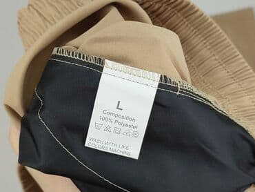 spodnie dresowe nike bez ściągaczy: Spodnie cargo damskie, rozmiar L — 4