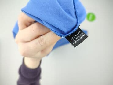 flared jeans: Spodnie materiałowe damskie, rozmiar L — 4