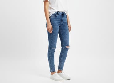 woskowane jeansy z wysokim stanem: Jeansy damskie, rozmiar M — 7