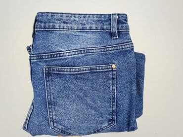 dziurawe dżinsy: Jeansy damskie, rozmiar L — 6