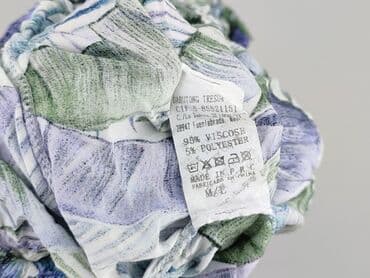 krótkie spodenki z szerokimi nogawkami: Spodnie damskie, rozmiar L — 4