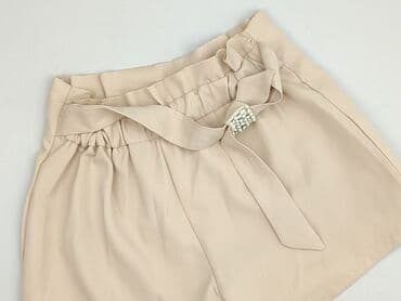 beżowe krótkie spodenki: Szorty damskie, rozmiar S — 1