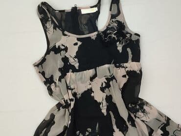 jakie rajstopy do srebrnej sukienki: Unika, Women`s dress, size L (EU 40) — 1