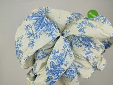 krótkie spodenki z szerokimi nogawkami: Spodnie materiałowe damskie, rozmiar L — 4