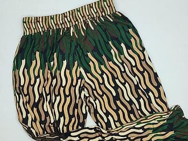 Damskie spodnie z szeroką gumą w pasie, w efektowny, falujący wzór w