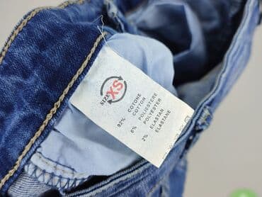 dziurawe dżinsy: Jeansy damskie, rozmiar XS — 5