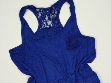 krótkie spodenki i nogi z cellulitem: Kombinezon damski, rozmiar L — 1