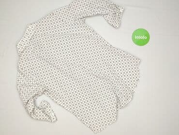 skladanie koszulki: Koszula damska, rozmiar XL — 3