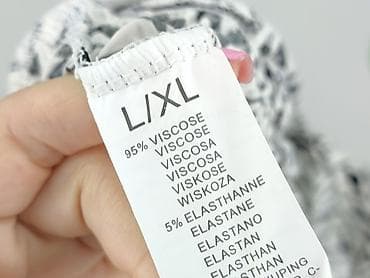 rysunki ubrań: Kombinezon damski L/XL – czarno-biały, geometryczny wzór - Fason — 5