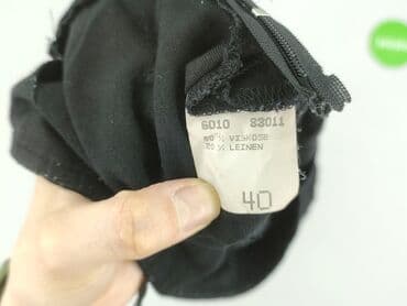 jeansy damskie podarte: Material trousers for women, size L (EU 40) — 4