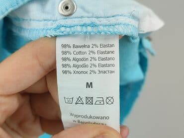 krótkie spodenki z ćwiekami: Szorty damskie, rozmiar M — 7