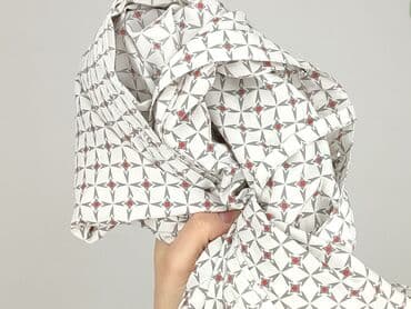 skladanie koszulki: Koszula damska, rozmiar XL — 5