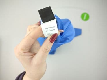 flared jeans: Spodnie materiałowe damskie, rozmiar L — 5