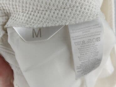 spódniczka mini rozkloszowane: Spódnica damska, rozmiar M — 4